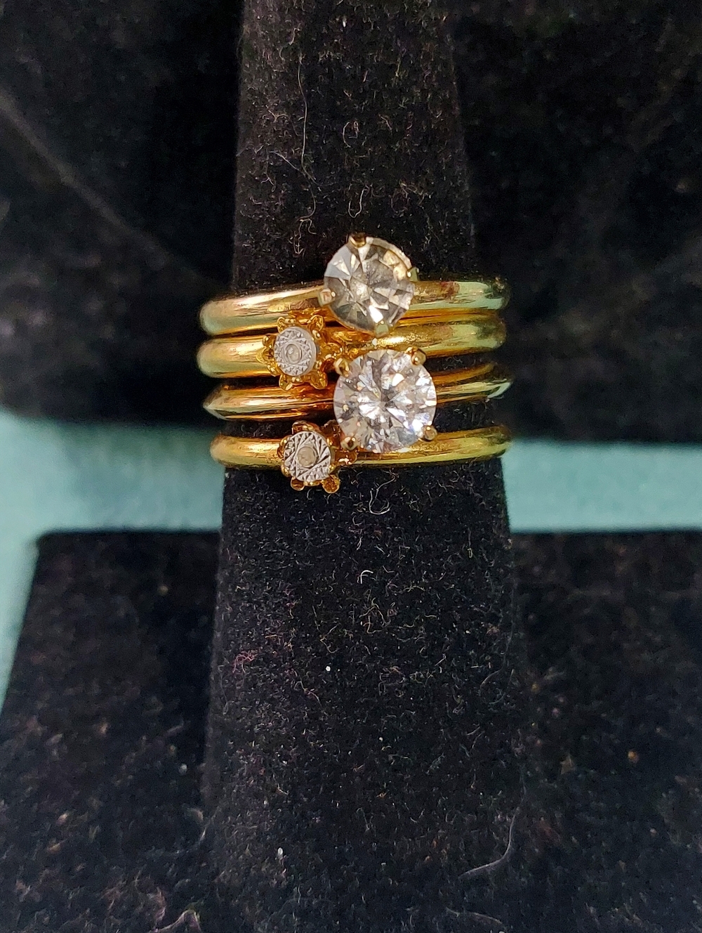 Four Rhinestone Goldtone Stackable Rings - Picture 3 of 15